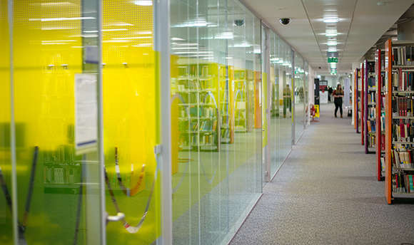 A corridor of modern study rooms at Ӱֱ, Edinburgh